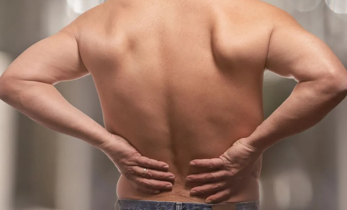 Dolor en la Base de la Columna